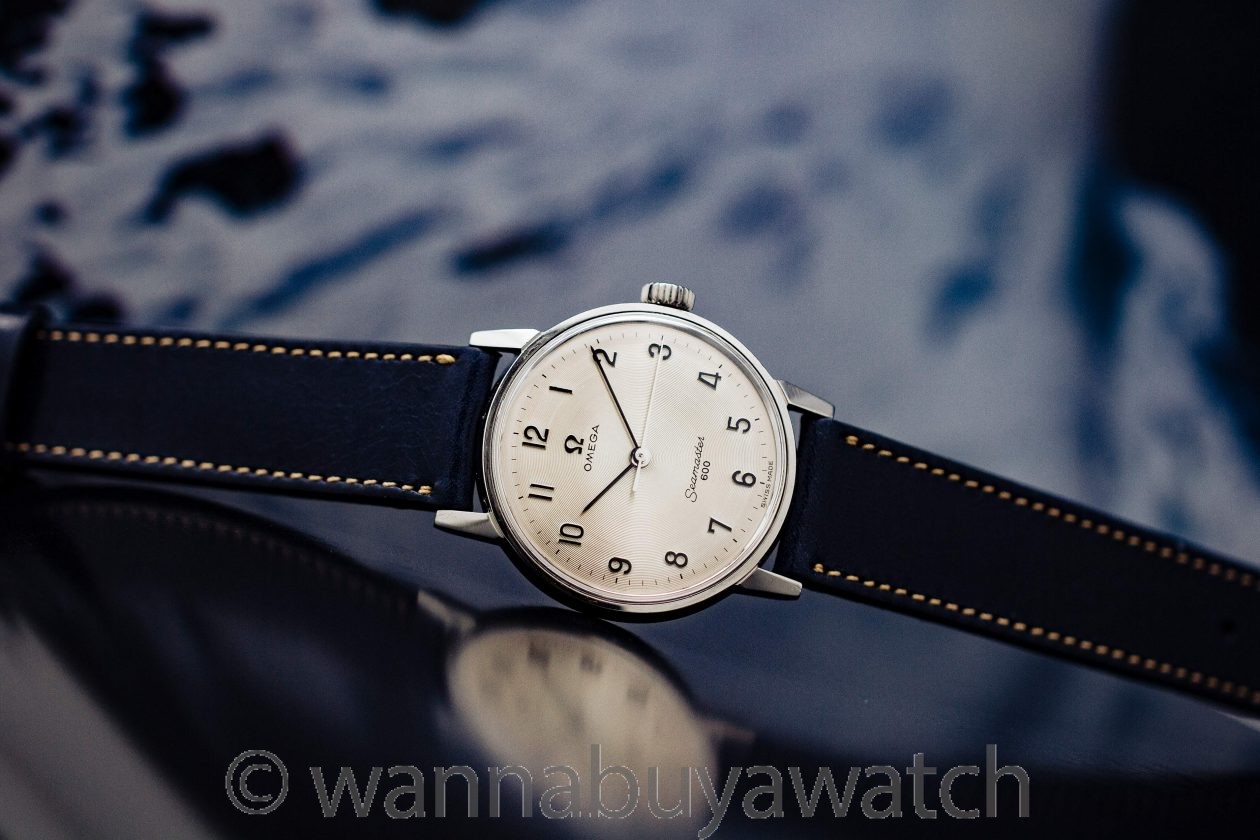 Omega Seamaster 135.011. Watch and strap, pre-replacement photo. Historical pre-replacement photograph. · Photo: Wanna Buy A Watch · © Wanna Buy A Watch; permission not yet confirmed · Source: https://wannabuyawatch.com/product/omega-seamaster-600-radial-dial-ref-135-011-circa-1968/