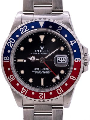 A very fine condition example Rolex GMT Master 1 "Pepsi" ref# 16700 with tritium indexes and hands. Case serial #N3 dates this example to 1991. With pleasing red and blue "Pepsi" insert, pristine condition gloss black dial with all original luminous plots, aged to a warm cream color, and slightly lighter tritium hands.